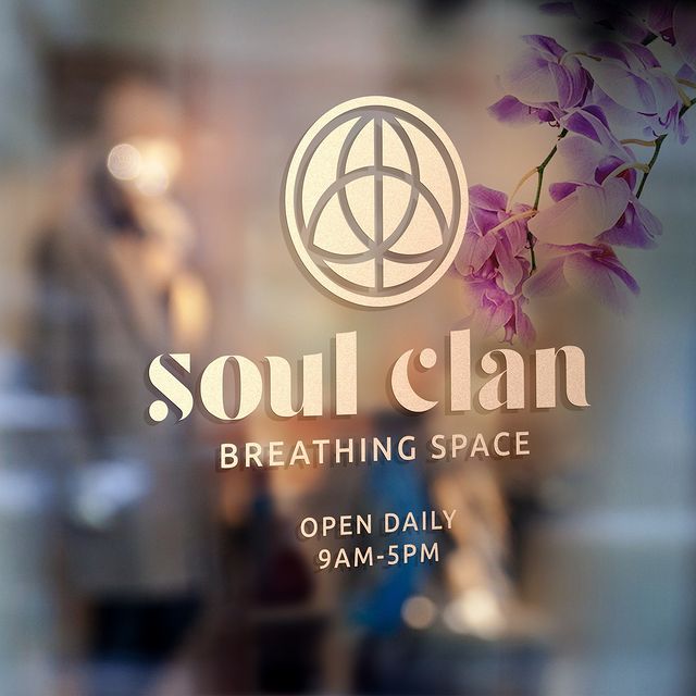 brand logo design in gold on glass door to show mock up of design.