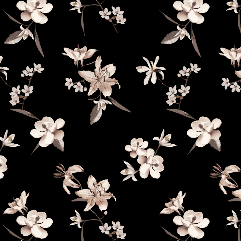 floral print with orchids and lilies on black background.
